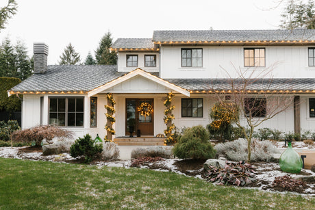 Home decorated with Christmas lights and garlands