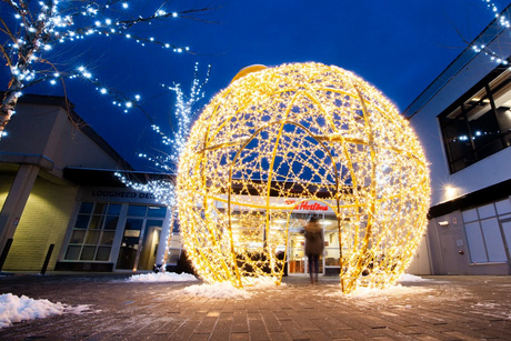 Illuminated Sculpture in outdoor plaza