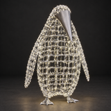 Penguin Sculpture — illuminated sculpture with beaded mini lights, dark studio view