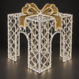 Present Sculpture — illuminated sculpture with beaded mini lights, dark studio view