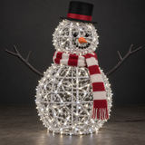 Snowman Sculpture — illuminated sculpture with beaded mini lights, dark studio view