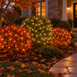 Thanksgiving Harvest Glow Bundle installed-result example showing three 25-ft foliage zones: two orange and one warm white